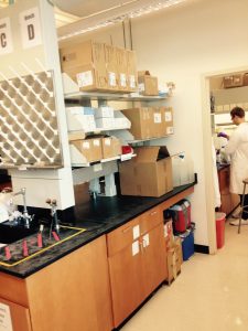 A student work bench with extra supplies stored there